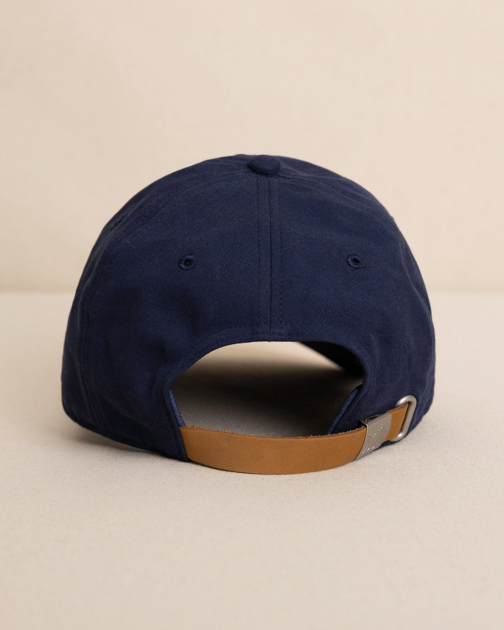 The back view of the Southern Tide Skipjack Canvas Leather Strap Hat by Southern Tide - Navy