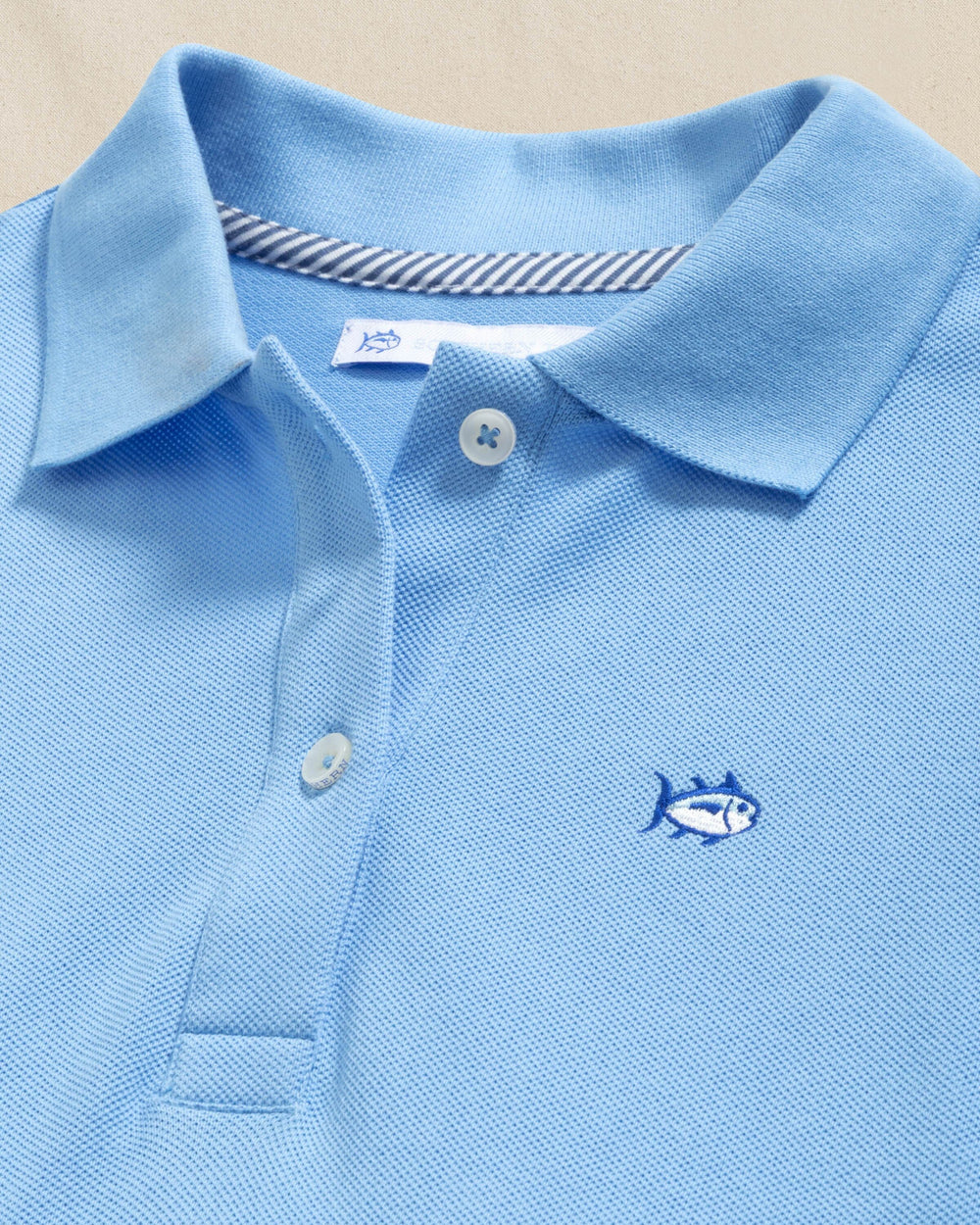 The detail view of the Southern Tide Skipjack Dropwaist Polo Dress by Southern Tide - Ocean Channel
