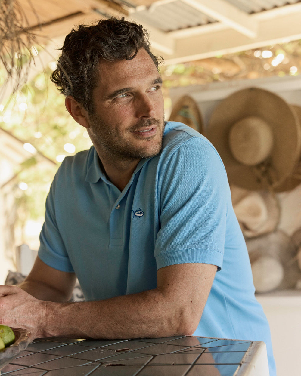 The lifestyle view of the Southern Tide Skipjack Polo Shirt by Southern Tide - Ocean Channel