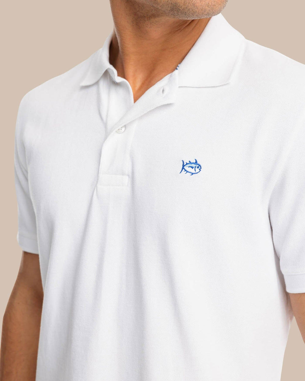 The model detail view of the Men's New Skipjack Polo Shirt by Southern Tide - Classic White
