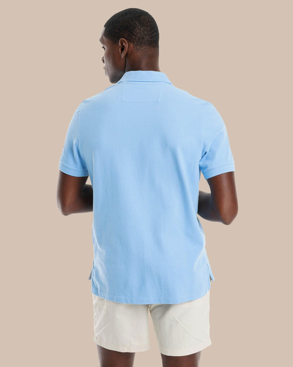 The model back view of the Men's New Skipjack Polo Shirt by Southern Tide - Ocean Channel