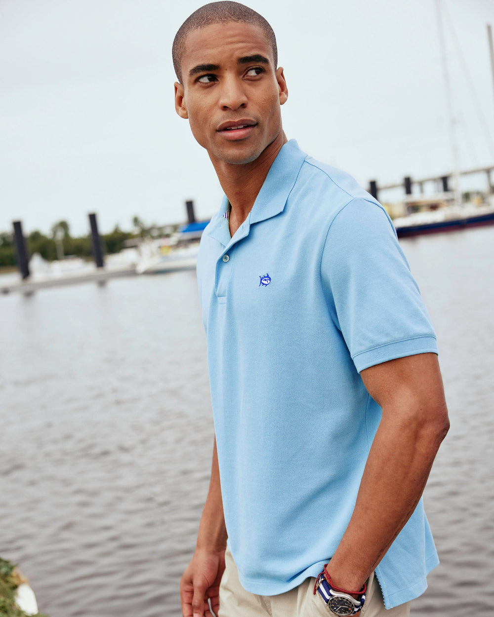 The lifestyle view of the Men's Skipjack Polo Shirt by Southern Tide - Ocean Channel