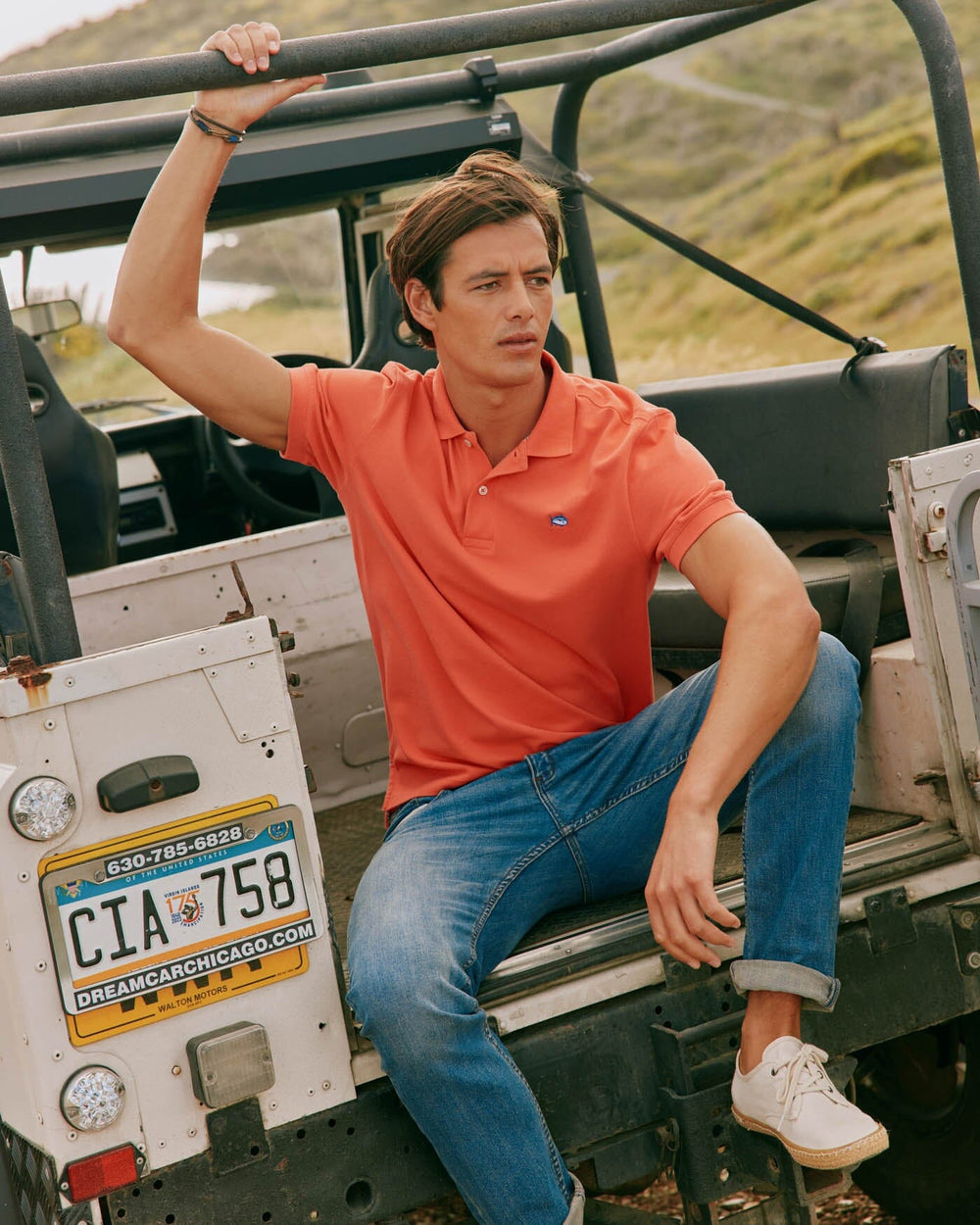 The front view of the Southern Tide new-skipjack-polo-shirt by Southern Tide - Paprika Red