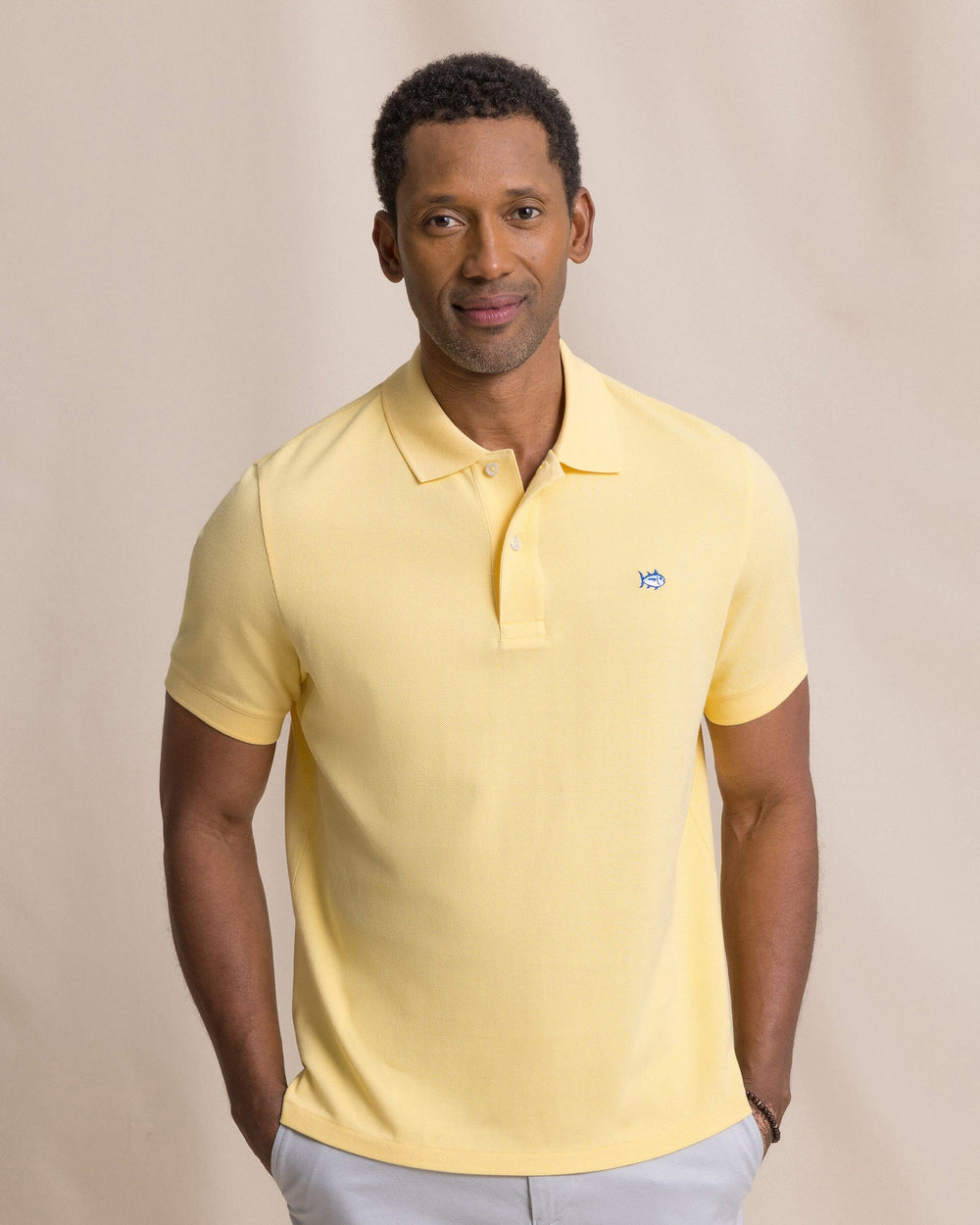 The front view of the Southern Tide Skipjack Polo Shirt by Southern Tide - Pineapple