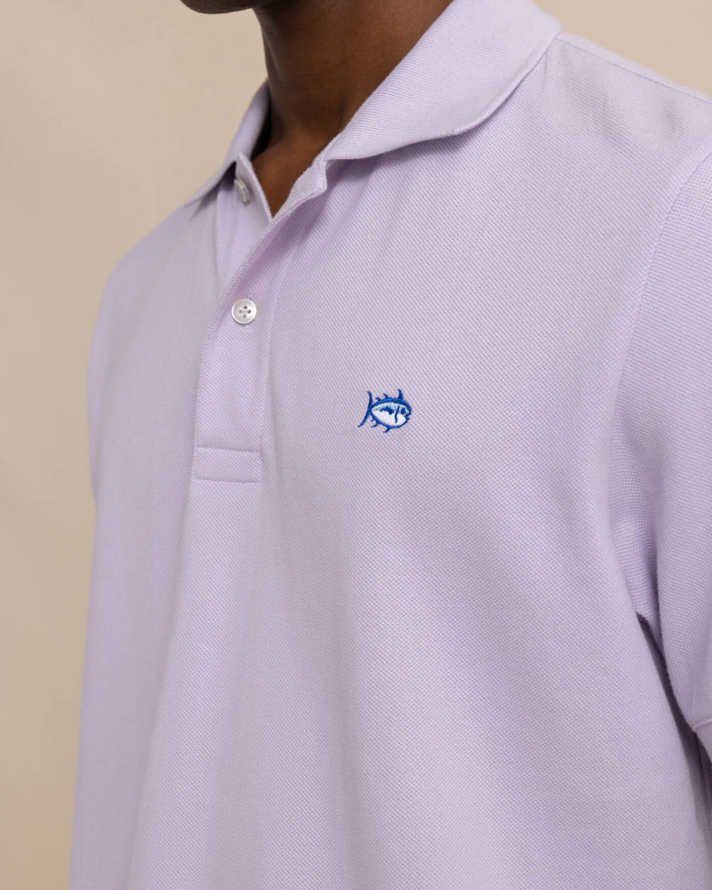 The detail view of the skipjack-polo-shirt-sale by Southern Tide - Orchid Petal