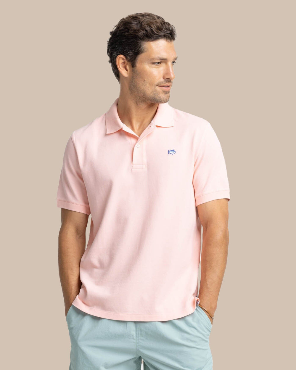 The front view of the Men's New Skipjack Polo Shirt by Southern Tide - Pale Rosette Pink