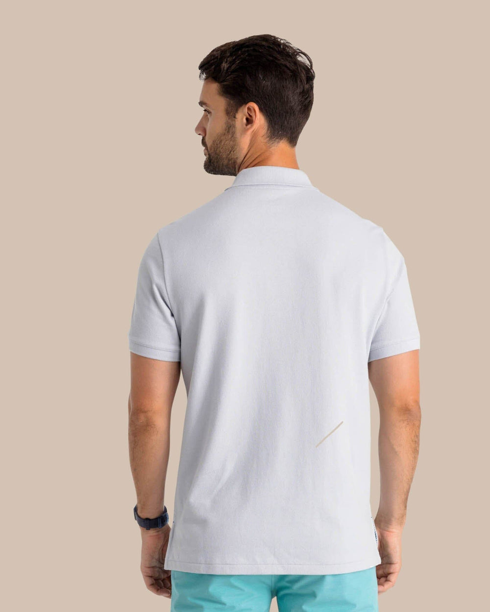 The back view of the Men's New Skipjack Polo Shirt by Southern Tide - Slate Grey