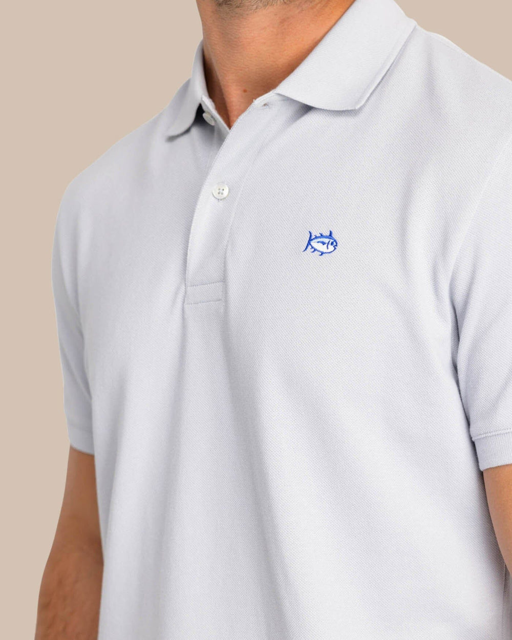 The model detail view of the Men's New Skipjack Polo Shirt by Southern Tide - Slate Grey