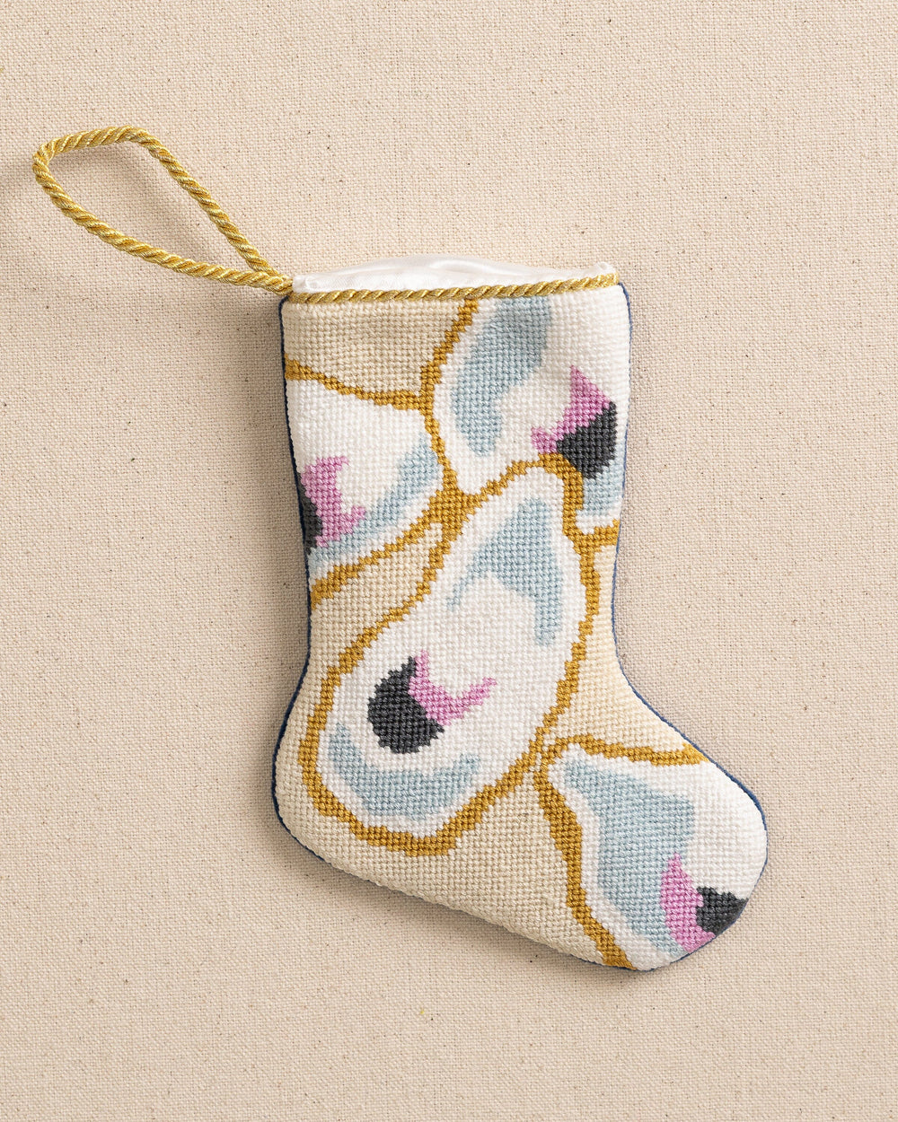 The front view of the Southern Tide Southern Oyster Needlepoint Stocking by Southern Tide - White