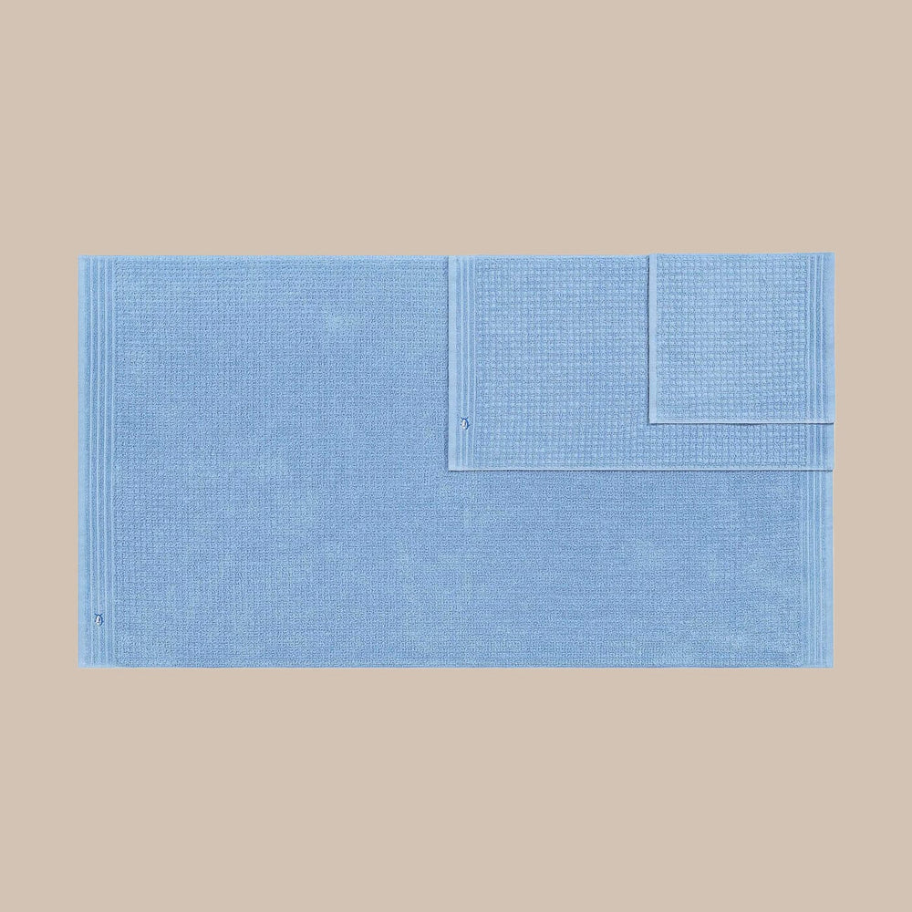 The front top view of the Southern Tide 6 Pack Waffle Towel Set by Southern Tide - Little Boy Blue