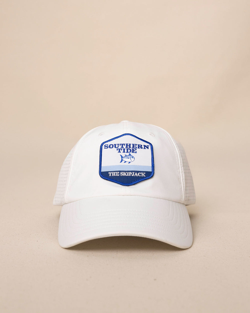 The front view of the Southern Tide Southern Tide Badge Performance Trucker Hat by Southern Tide - White