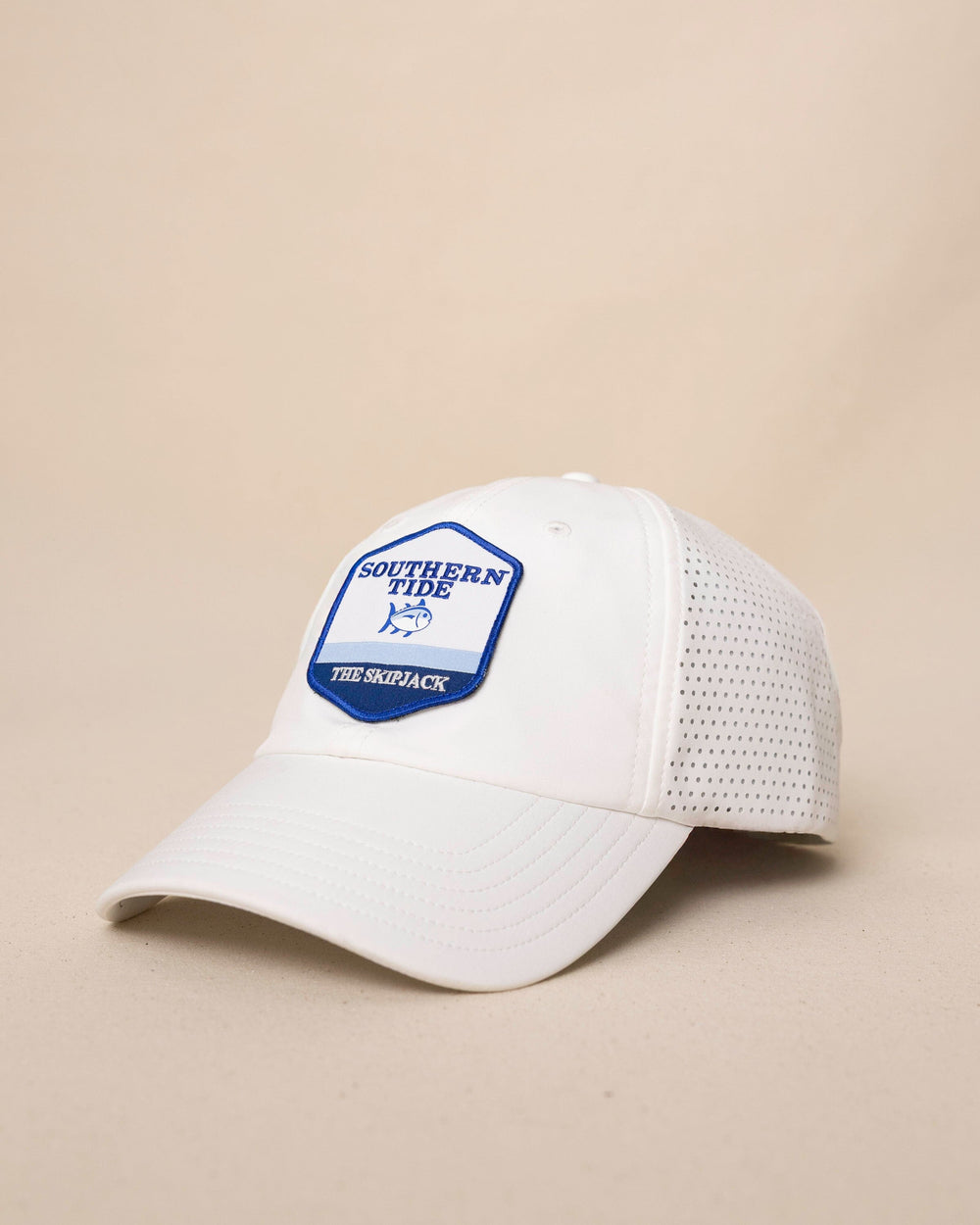 The side view of the Southern Tide Southern Tide Badge Performance Trucker Hat by Southern Tide - White