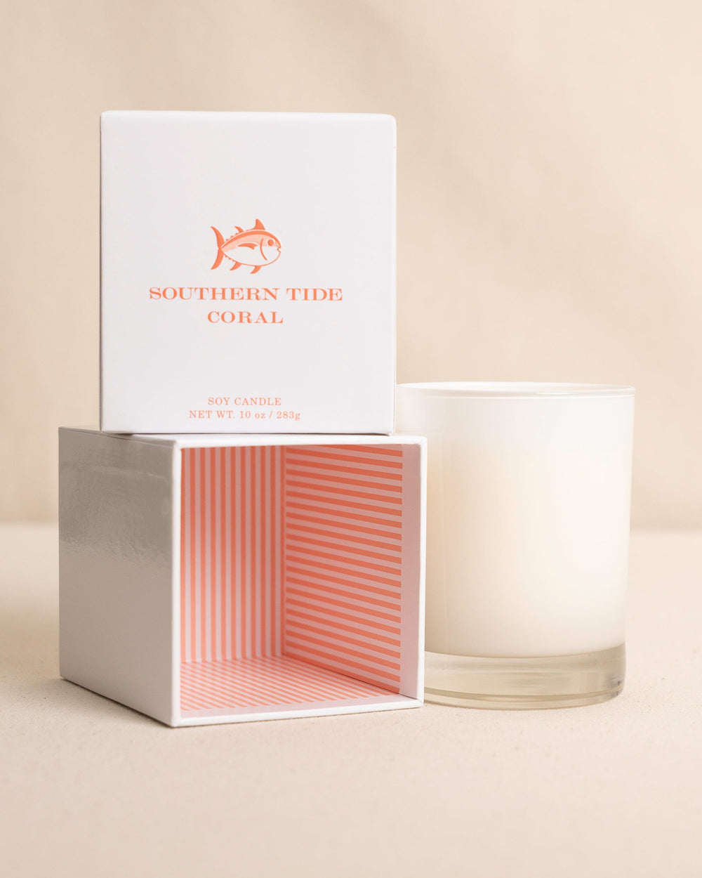 The front view of the Southern Tide Coral Scented Candle by Southern Tide - Coral