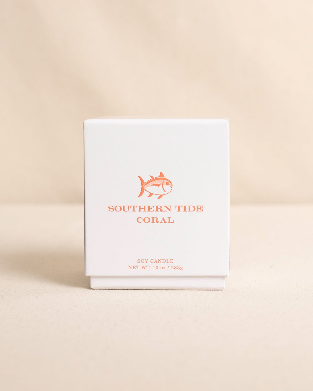 The front view of the Southern Tide Coral Scented Candle by Southern Tide - Coral