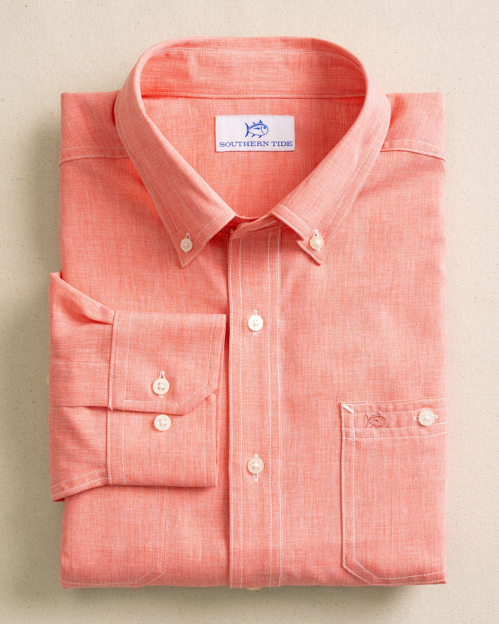 The front view of the Southern Tide Dock Shirt by Southern Tide - Sunkist Coral