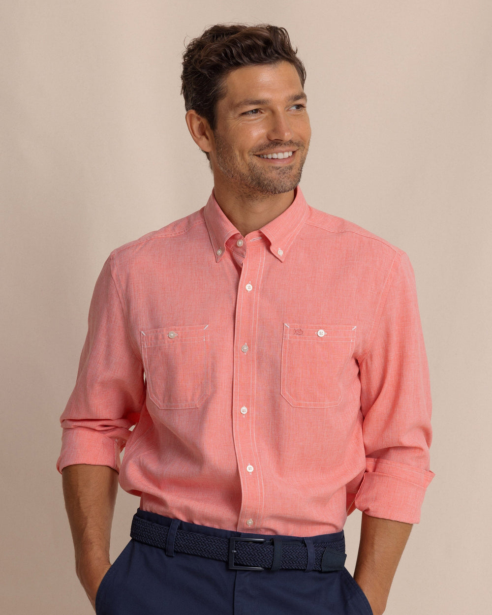 The front view of the Southern Tide Dock Shirt by Southern Tide - Sunkist Coral