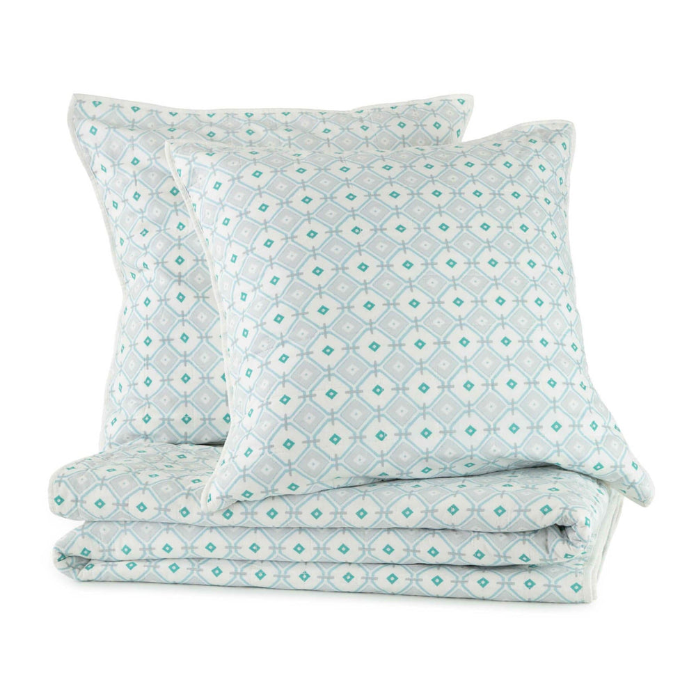 The quilt and pillows view of the Southern Tide Southern Tide Emerald Isle Blue Quilt by Southern Tide - Blue