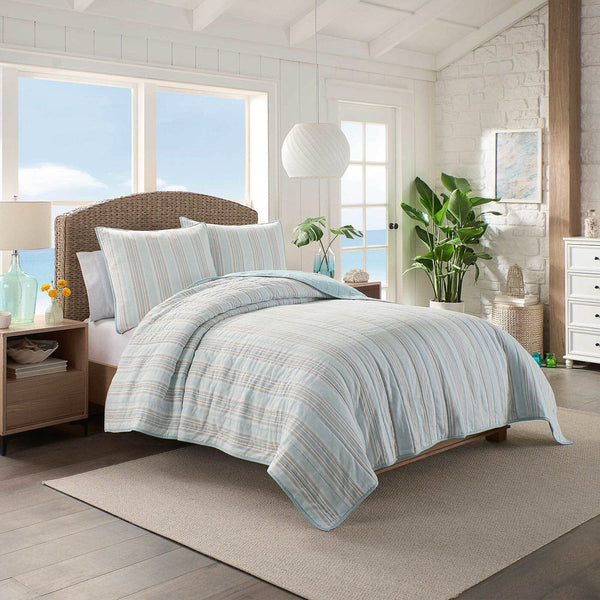 The lifestyle view of the Southern Tide Pawley's Island Blue Quilt by Southern Tide - Blue