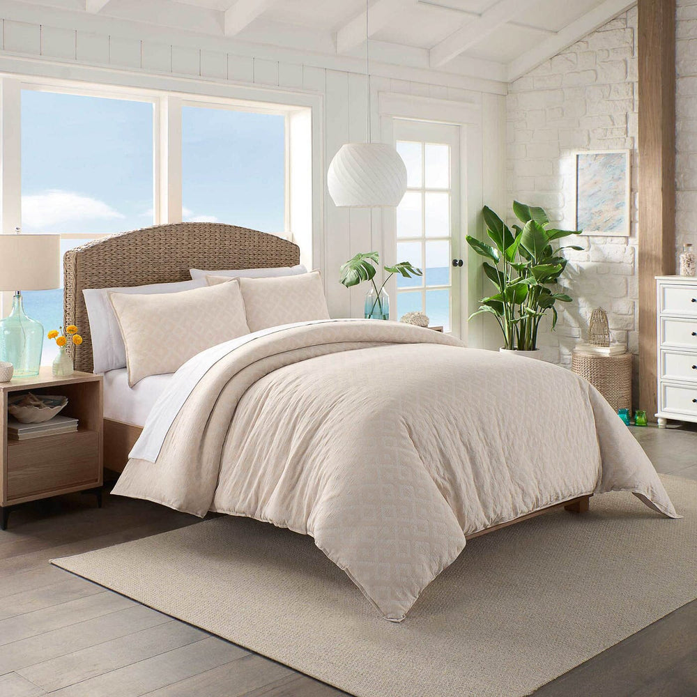 The lifestyle view of the Southern Tide Pawley's Island Tan Comforter Set by Southern Tide - Tan