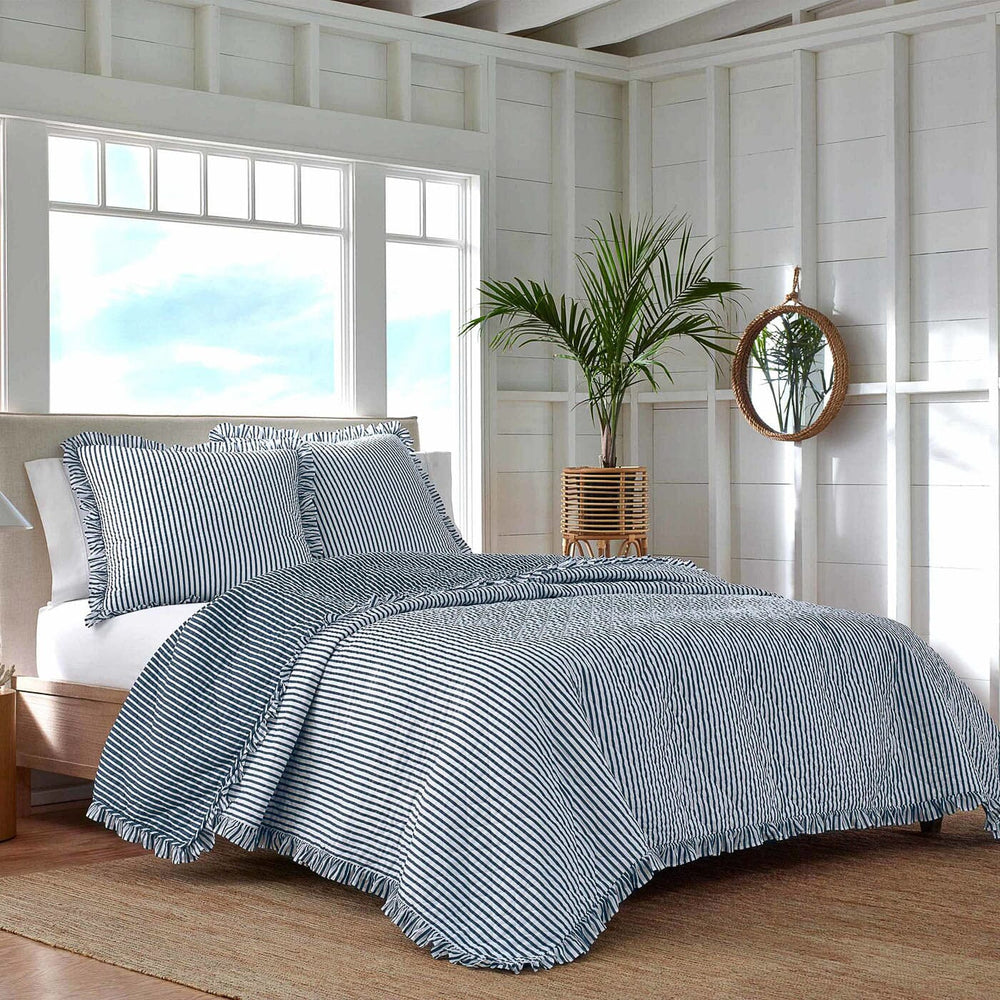 The lifestyle view of the Southern Tide South Shore Blue Quilt by Southern Tide - Blue