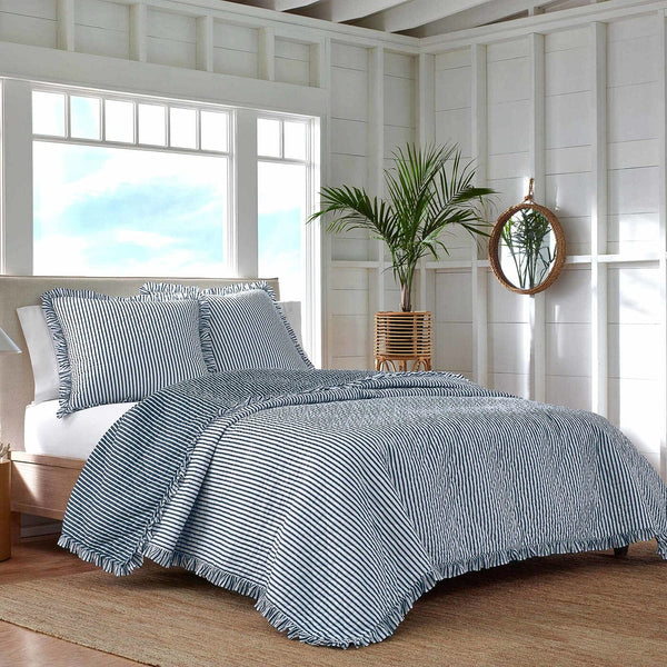 The lifestyle view of the Southern Tide South Shore Blue Quilt by Southern Tide - Blue