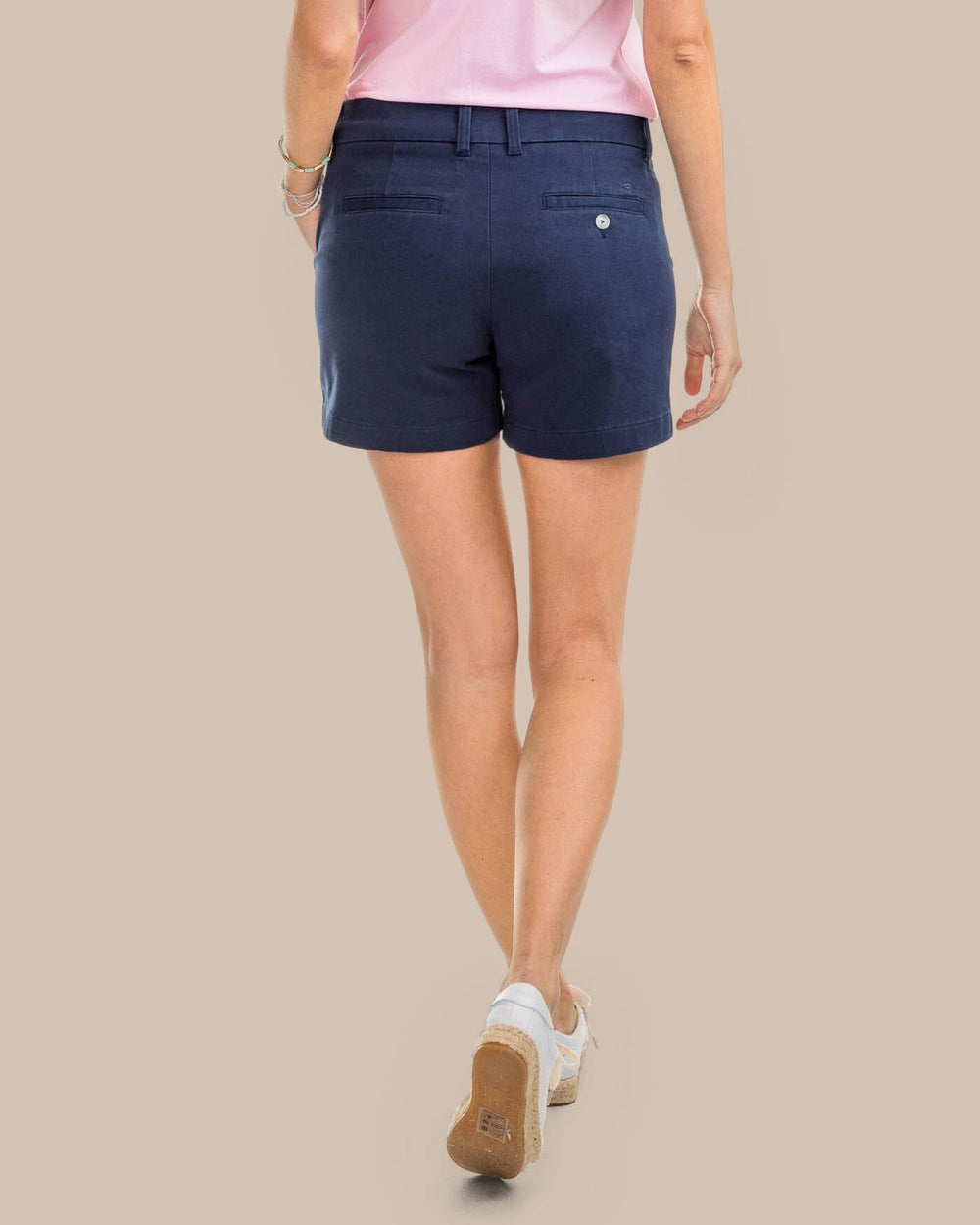 The back view of the Women's Navy 3" Leah Seersucker Short by Southern Tide - Nautical Navy