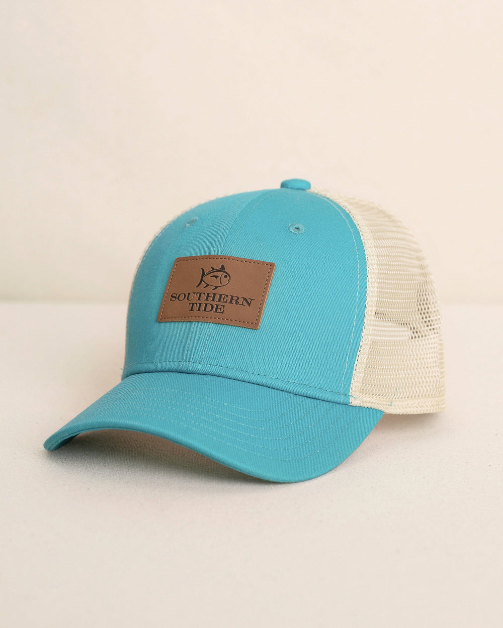 The front view of the Southern Tide ST Leather Patch Trucker Hat by Southern Tide - Spruce Shade