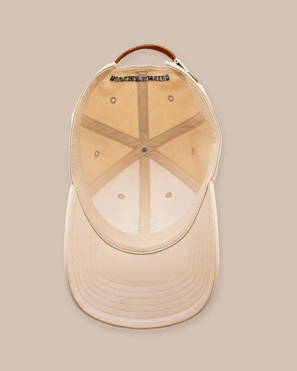 The bottom view of the Southern Tide ST Letterman Leather Strap Hat by Southern Tide - Oatmeal