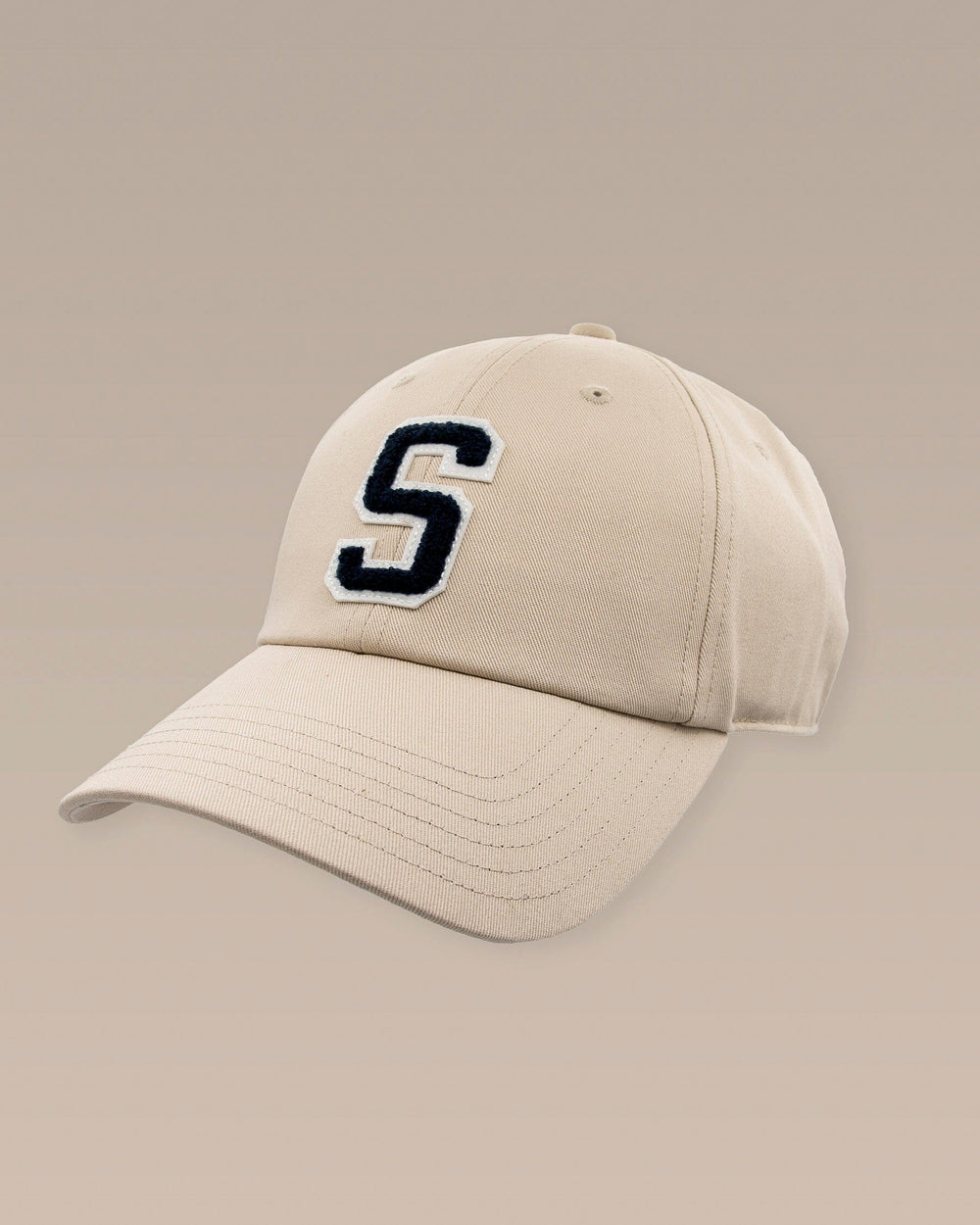 The front view of the Southern Tide ST Letterman Leather Strap Hat by Southern Tide - Oatmeal