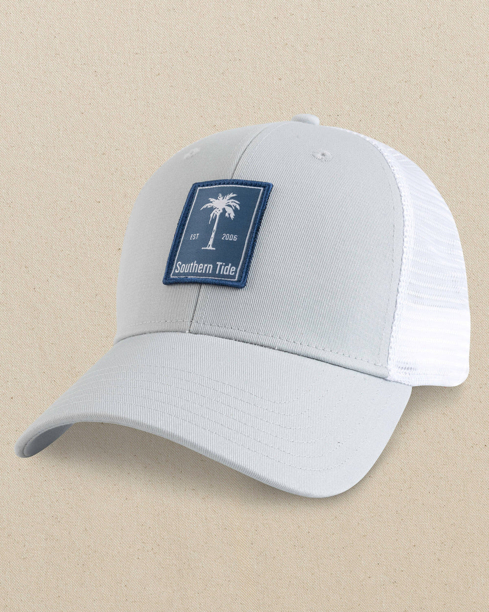 The front view of the Southern Tide ST Palmetto Trucker Hat by Southern Tide - Light Grey