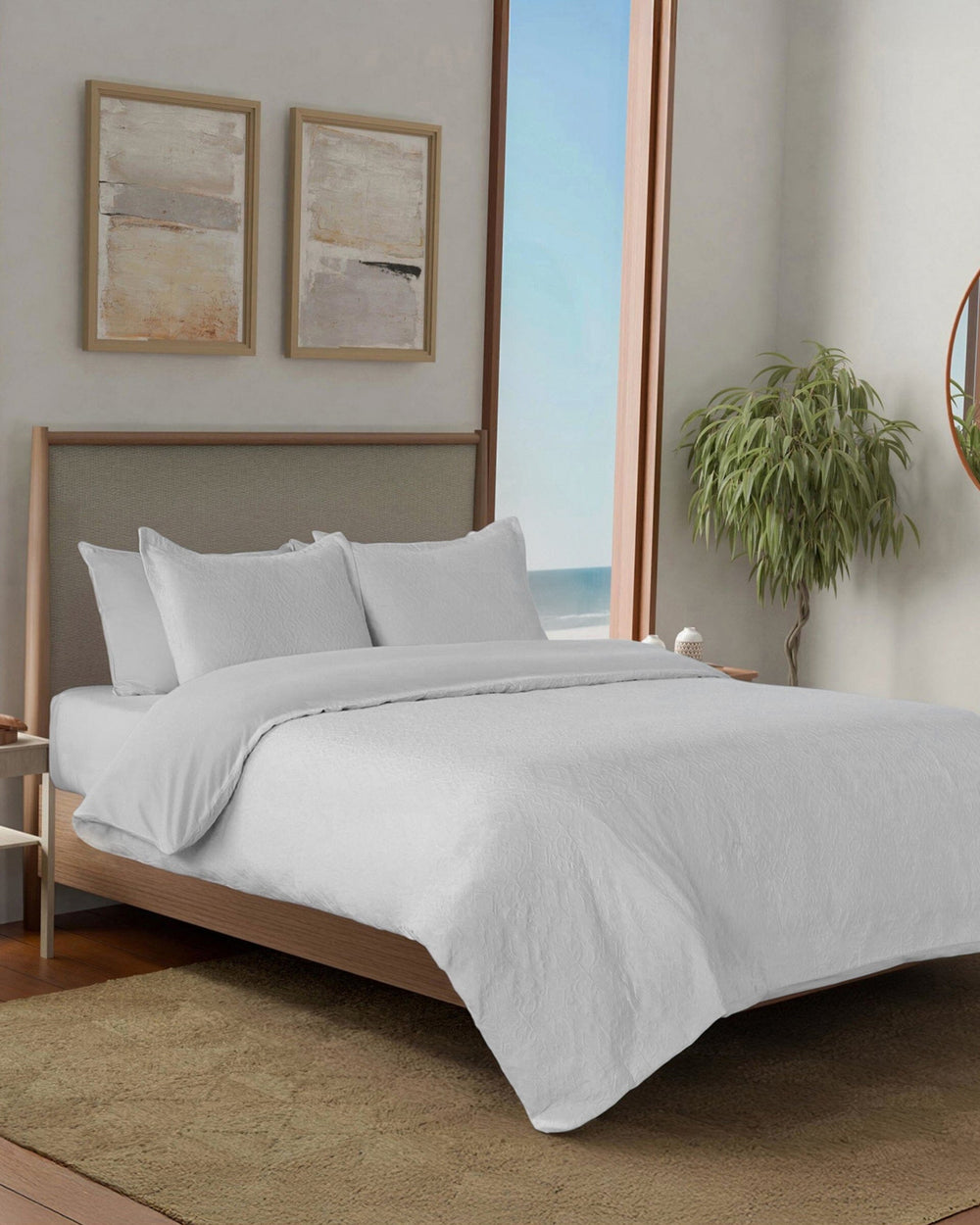 The side view of the Southern Tide St. Simons Comforter Set by Southern Tide - White