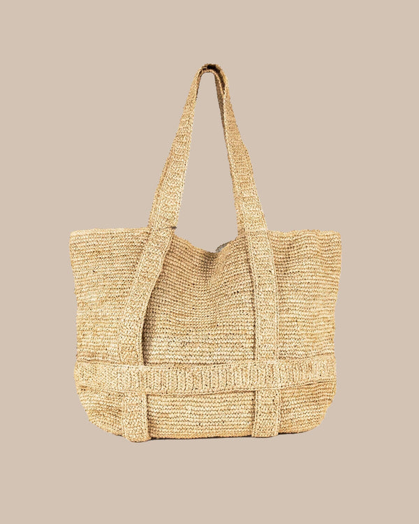 The front view of the Southern Tide Straw Hat Carrier Beach Tote by Southern Tide - Natural