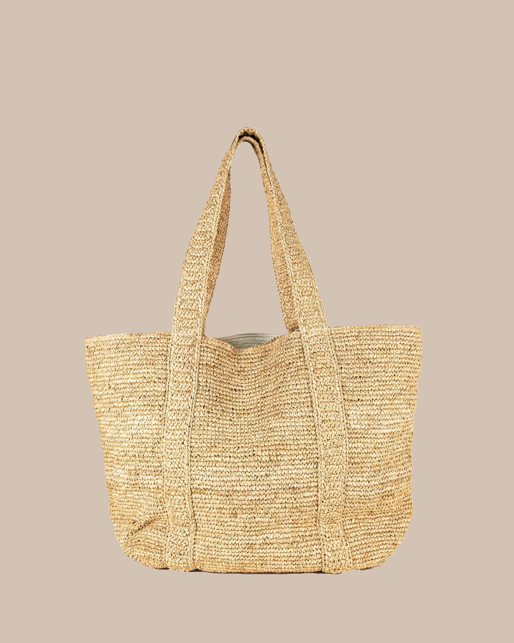 The back view of the Southern Tide Straw Hat Carrier Beach Tote by Southern Tide - Natural
