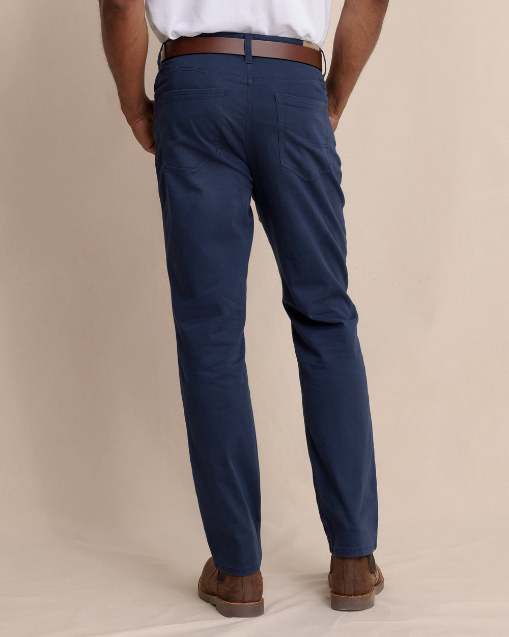 The back view of the Southern Tide Sullivan Five Pocket Pant in Dress Blue by Southern Tide - Dress Blue