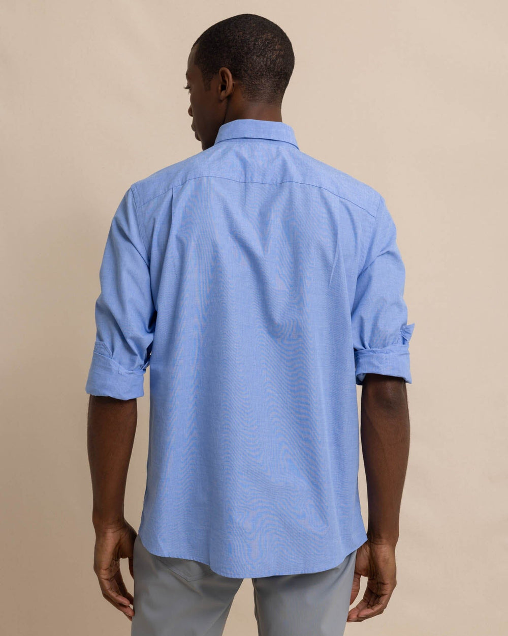 The back view of the Men's Blue Sullivans Solid Button Down Shirt by Southern Tide - Sail Blue
