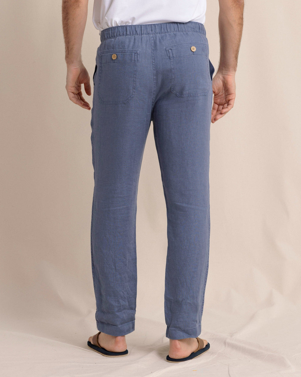 The back view of the Southern Tide Summer Bay Linen Pant by Southern Tide - Light Indigo