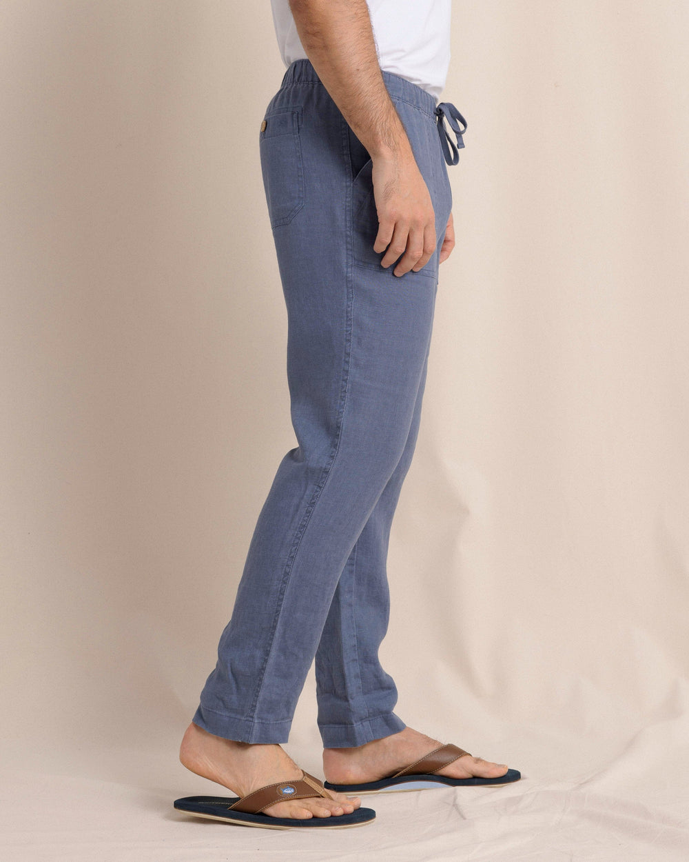 The side view of the Southern Tide Summer Bay Linen Pant by Southern Tide - Light Indigo