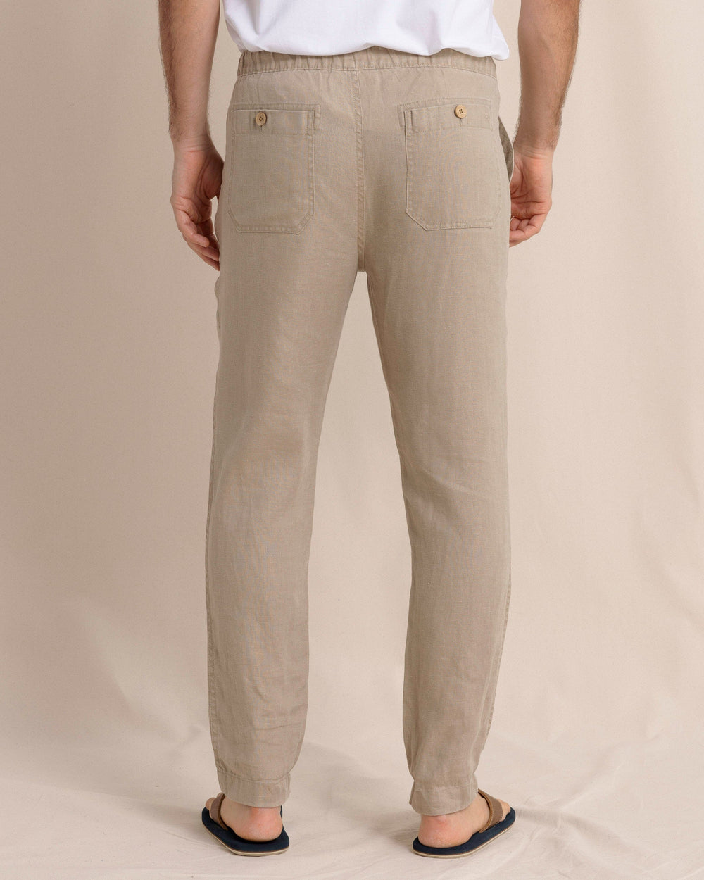 The back view of the Southern Tide Summer Bay Linen Pant by Southern Tide - Sandstone Khaki