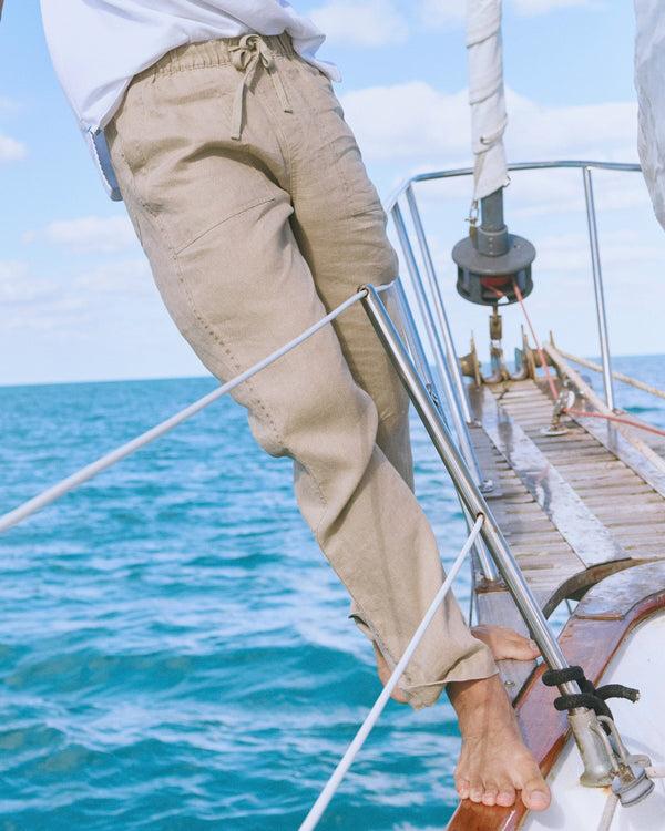 The lifestyle view of the Southern Tide Summer Bay Linen Pant by Southern Tide - Sandstone Khaki