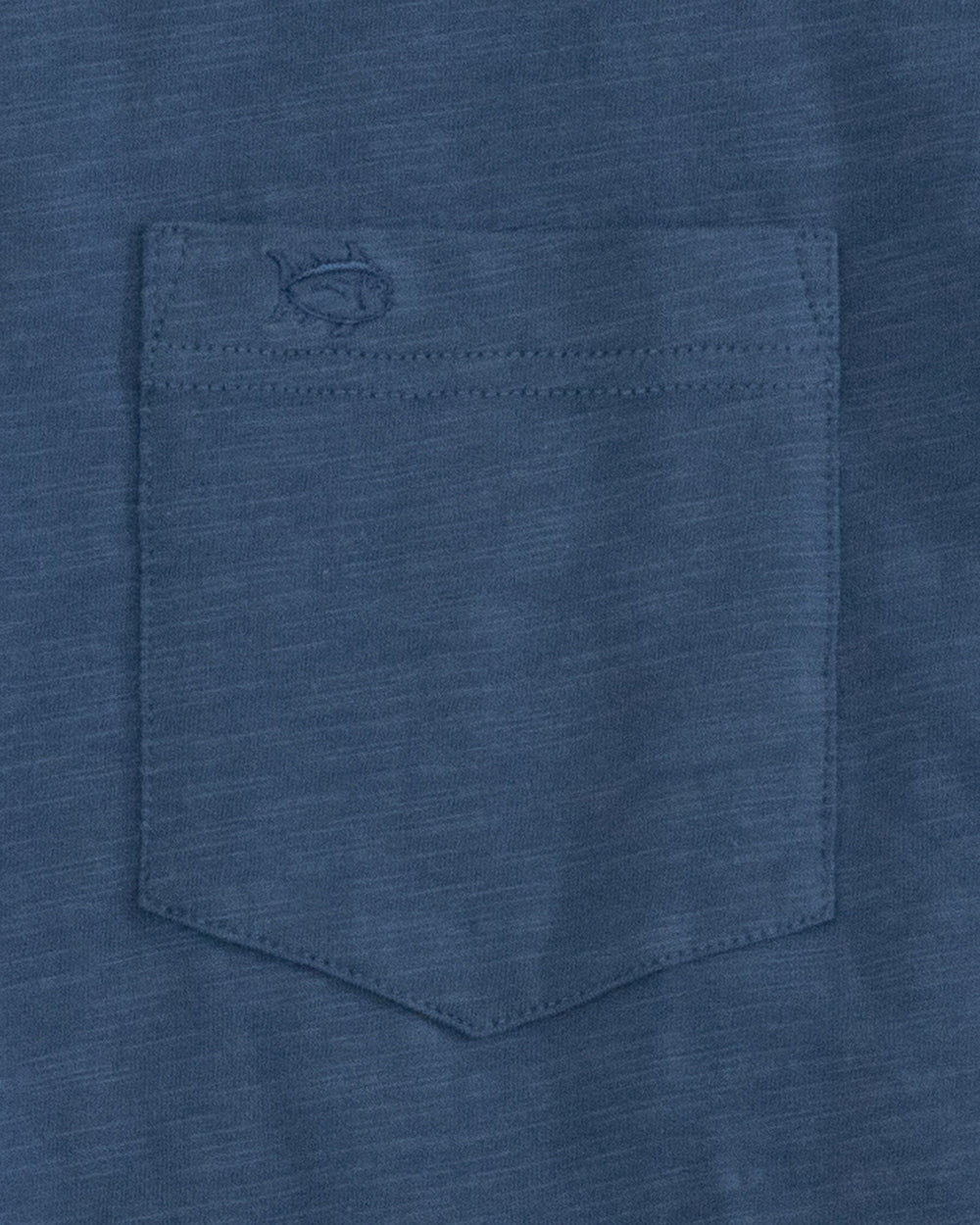 The pocket of the Men's Sun Farer Short Sleeve T-Shirt by Southern Tide - Dark Denim
