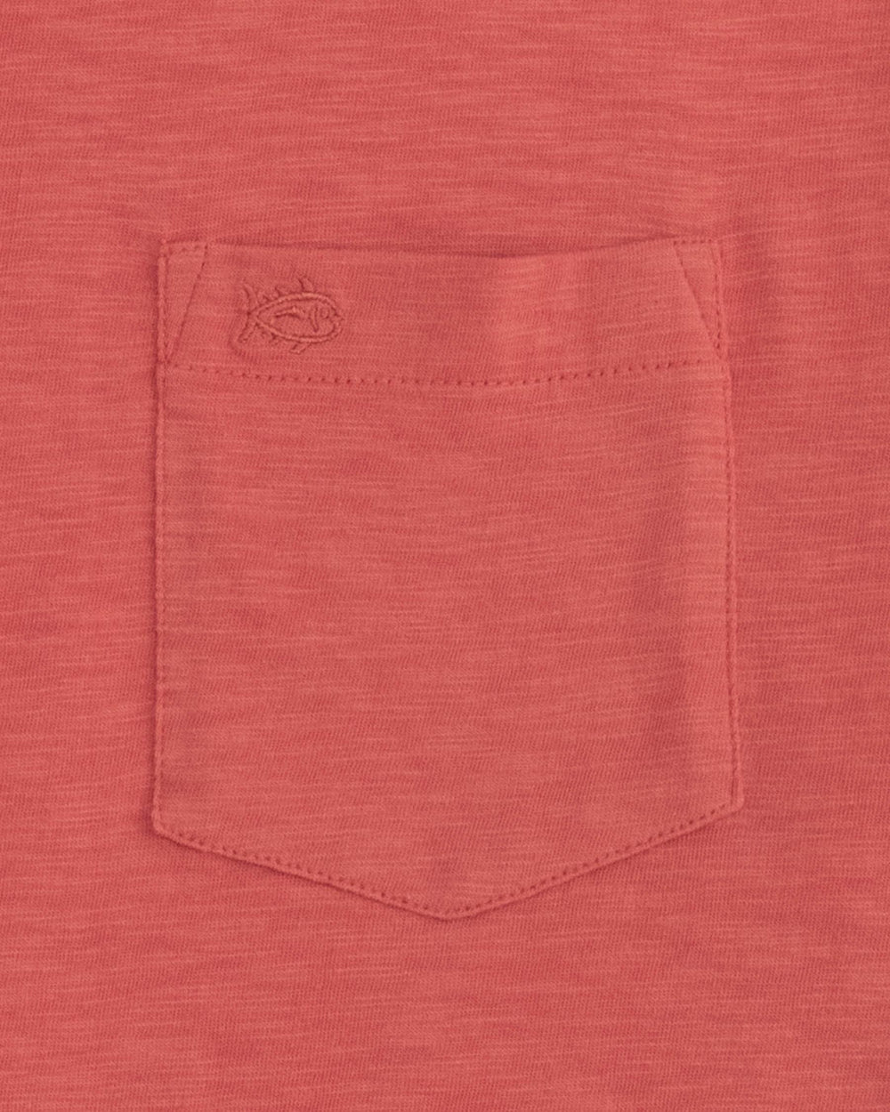 The pocket view of the Sun Farer T-Shirt by Southern Tide - Mineral Red