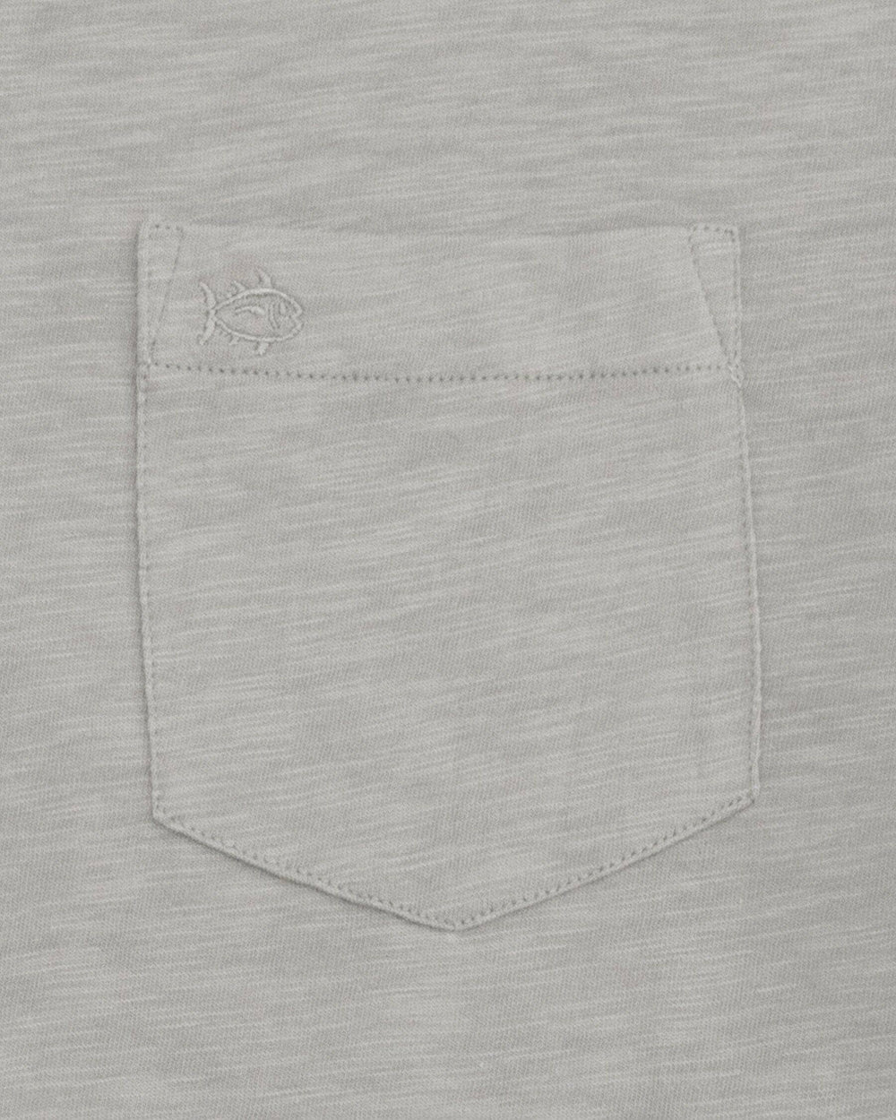 The front pocket of the Men's Sun Farer Short Sleeve T-Shirt by Southern Tide - Steel Grey