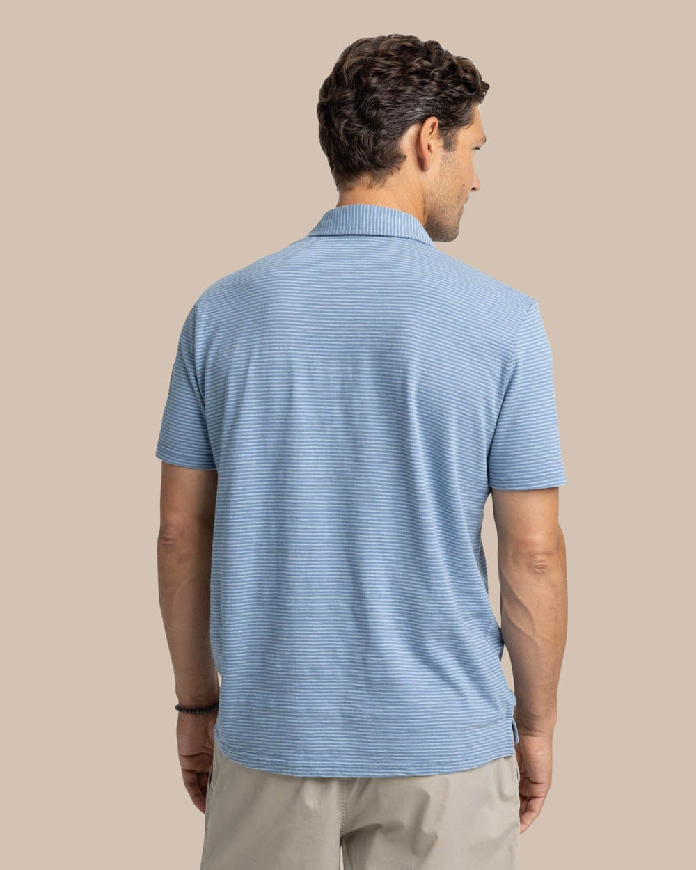 The back view of the Southern Tide Sun Farer Summertree Stripe Polo by Southern Tide - Coronet Blue