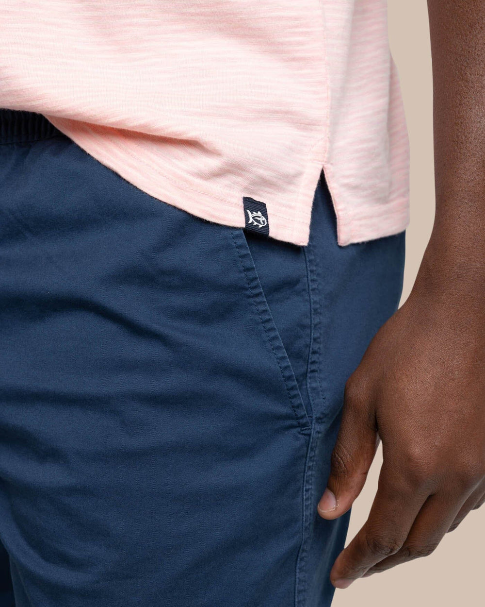 The detail view of the Southern Tide Sun Farer Summertree Stripe Polo by Southern Tide - Pale Rosette Pink