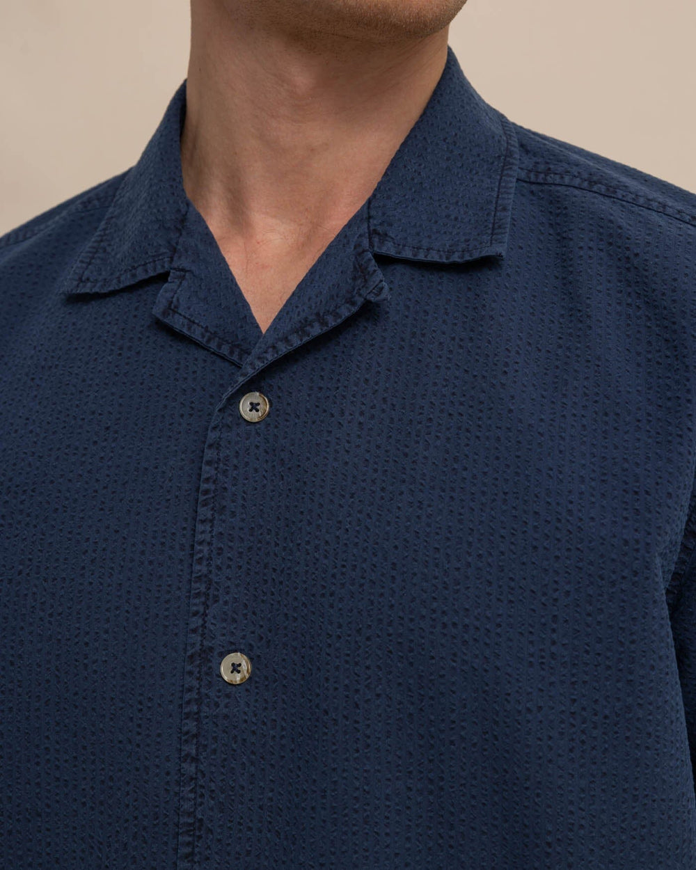 The detail view of the Southern Tide Sun Washed Seerscuker Camp Short Sleeve Sport Shirt by Southern Tide - Dress Blue
