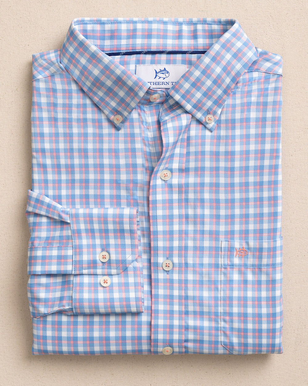 The front view of the Southern Tide Sunset Harbor brrr°® Intercoastal Sport Shirt by Southern Tide - Sunkist Coral