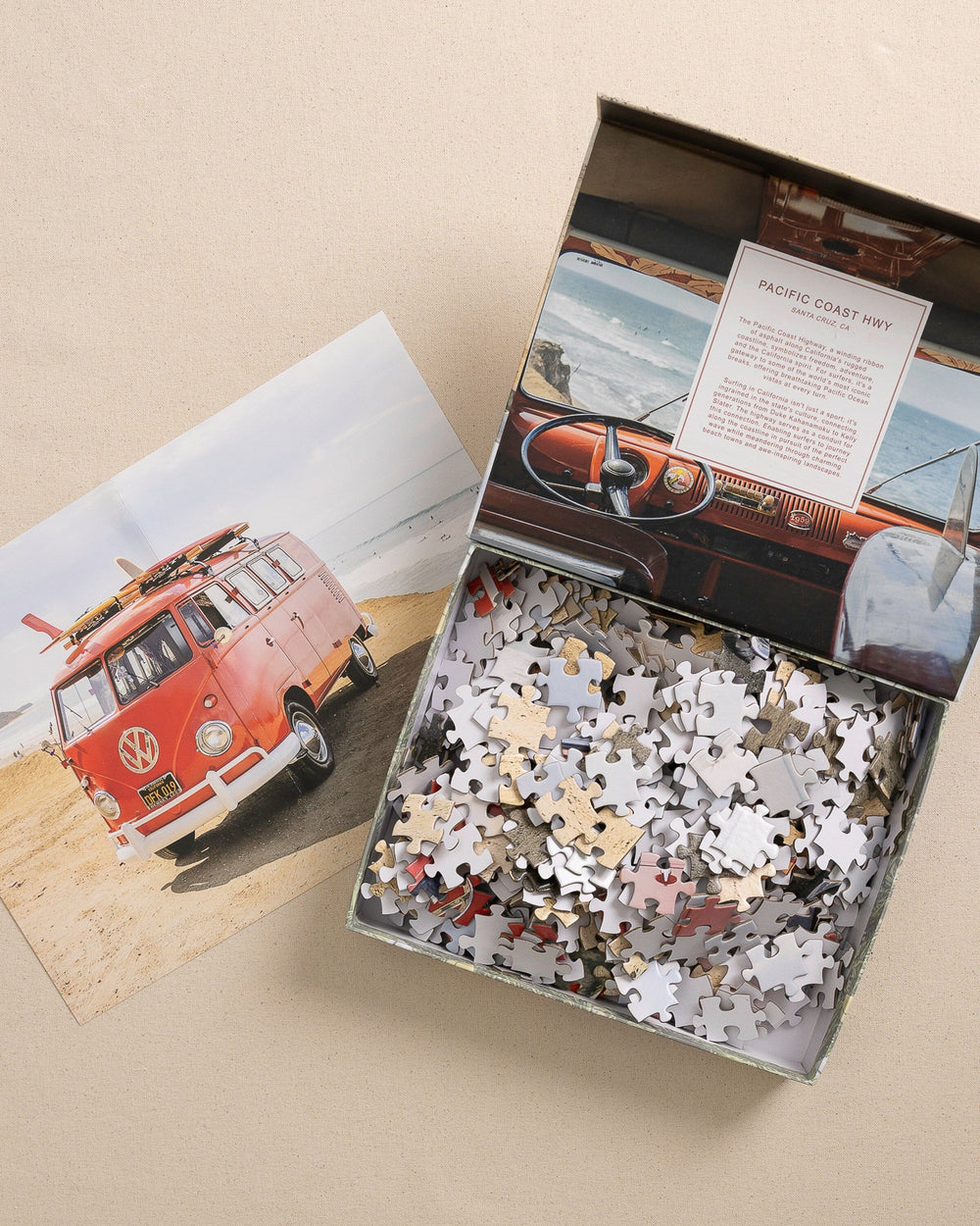 The open detail view of the Johnny Vacay Surf Bus 500 Piece Puzzle at Southern Tide - White