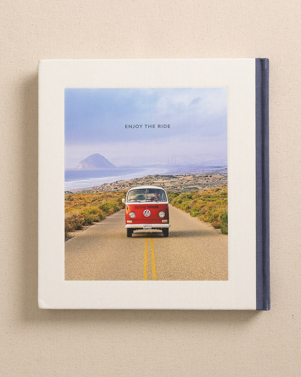 The back view of the Johnny Vacay Surf Rides Coffee Table Book at Southern Tide - White