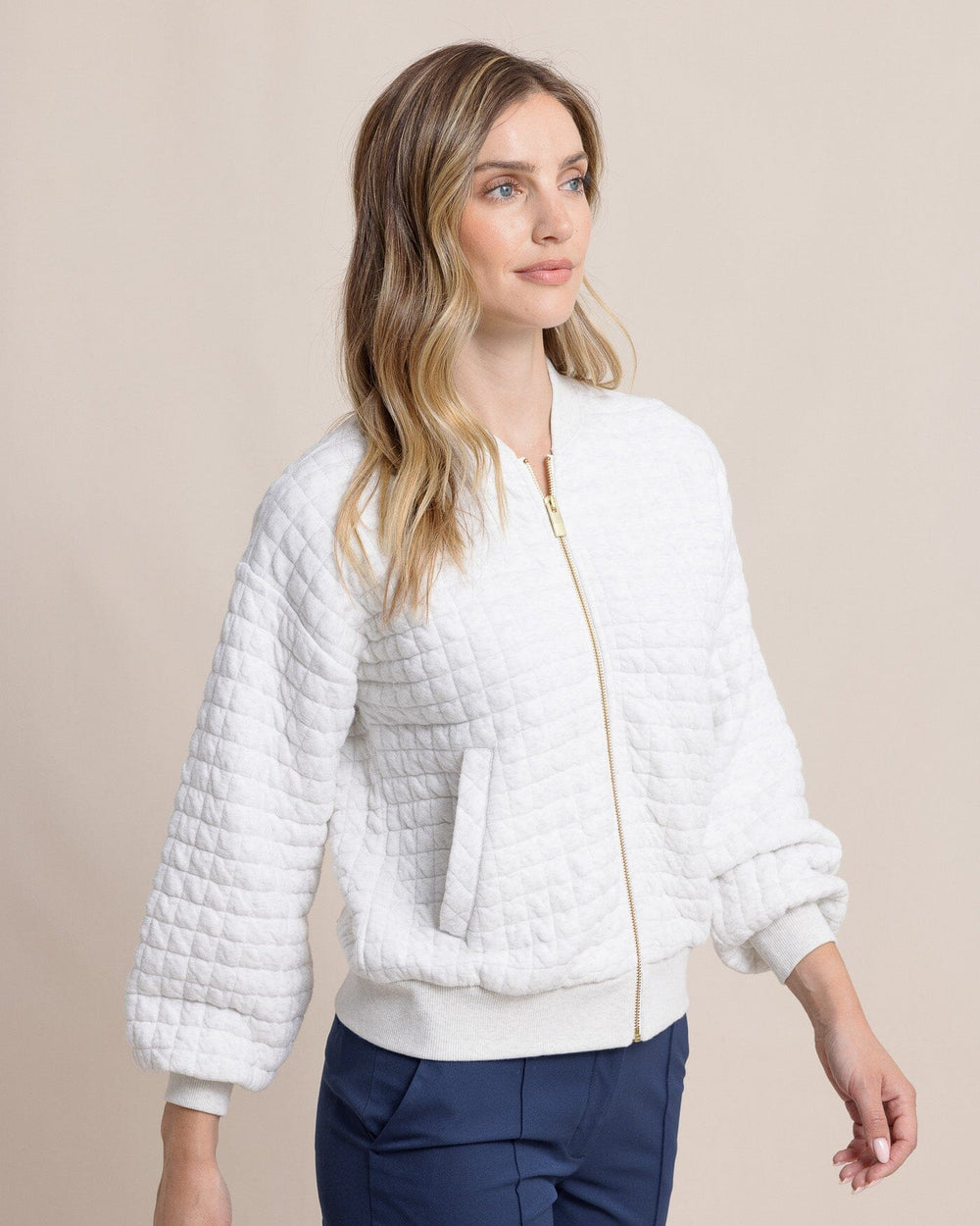 The side view of the Southern Tide Sutton Quilted Heather Jacket by Southern Tide - Heather Star White