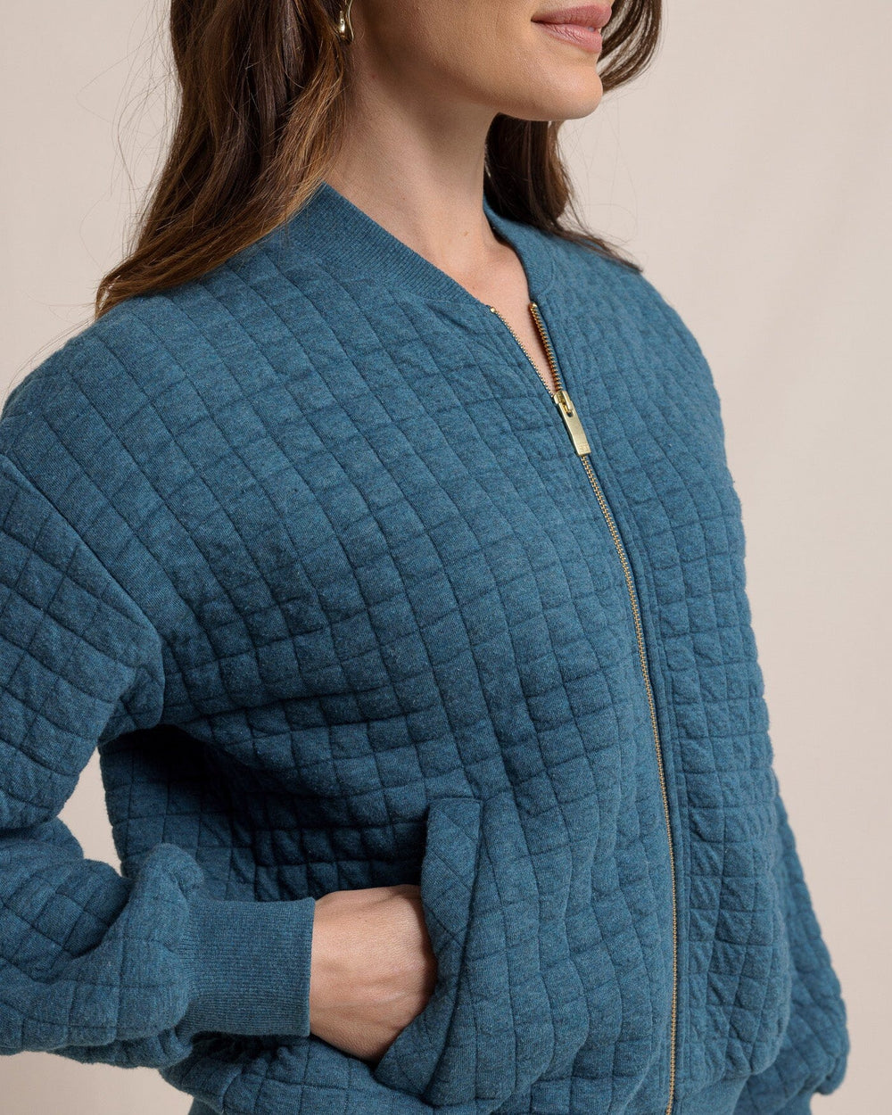 The detail view of the Southern Tide Sutton Quilted Heather Jacket by Southern Tide - Heather Teal Haze